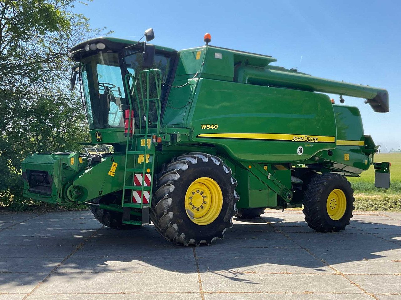 John Deere W540 - Autokombajnë: foto 1 John Deere W540 - Autokombajnë: foto 1