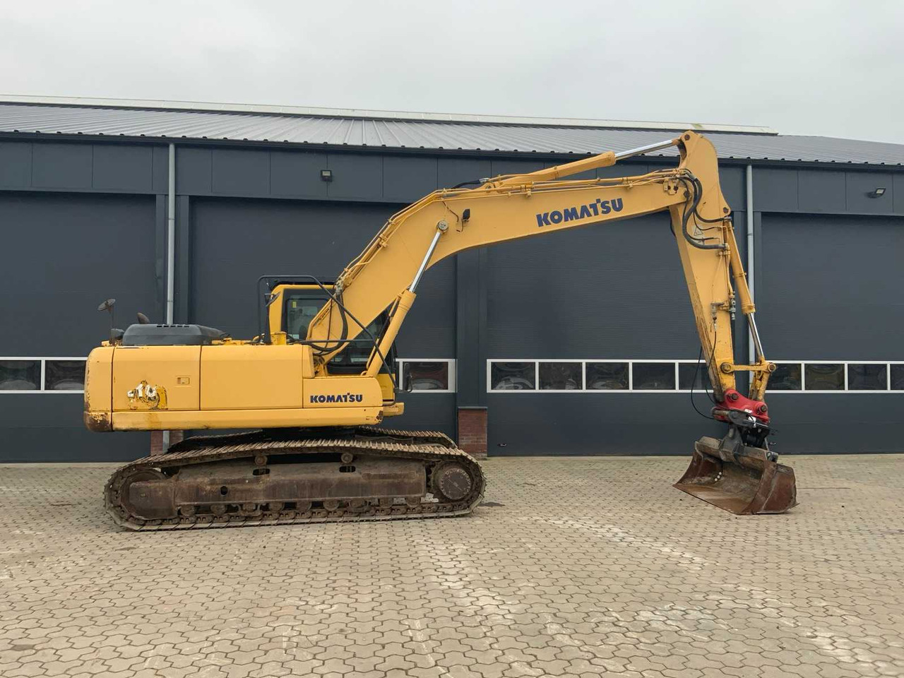 Komatsu 210 - Ekskavator me zinxhirë: foto 4 Komatsu 210 - Ekskavator me zinxhirë: foto 4