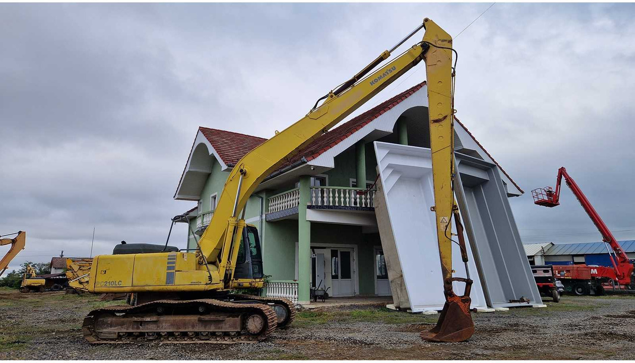 Komatsu PC 210 LC - Ekskavator me zinxhirë: foto 5 Komatsu PC 210 LC - Ekskavator me zinxhirë: foto 5