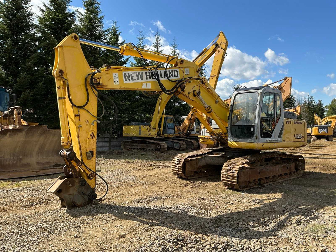 NEW HOLLAND KOBELCO E 215B - Ekskavator me zinxhirë: foto 1 NEW HOLLAND KOBELCO E 215B - Ekskavator me zinxhirë: foto 1