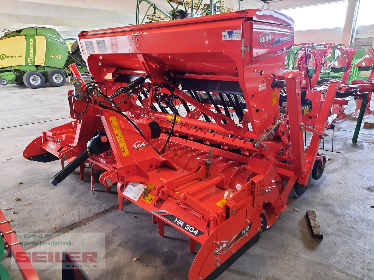 Kuhn HR 304 + Sitera 330-20E - Mbjellëse e kombinuar në radhë: foto 1 Kuhn HR 304 + Sitera 330-20E - Mbjellëse e kombinuar në radhë: foto 1