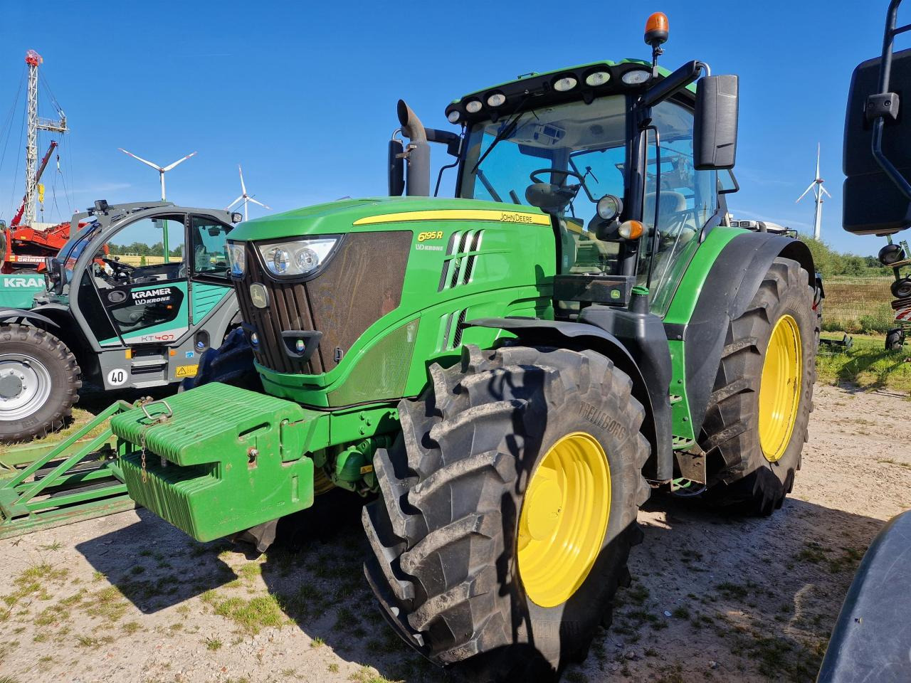 John Deere 6195R - Traktor: foto 1 John Deere 6195R - Traktor: foto 1