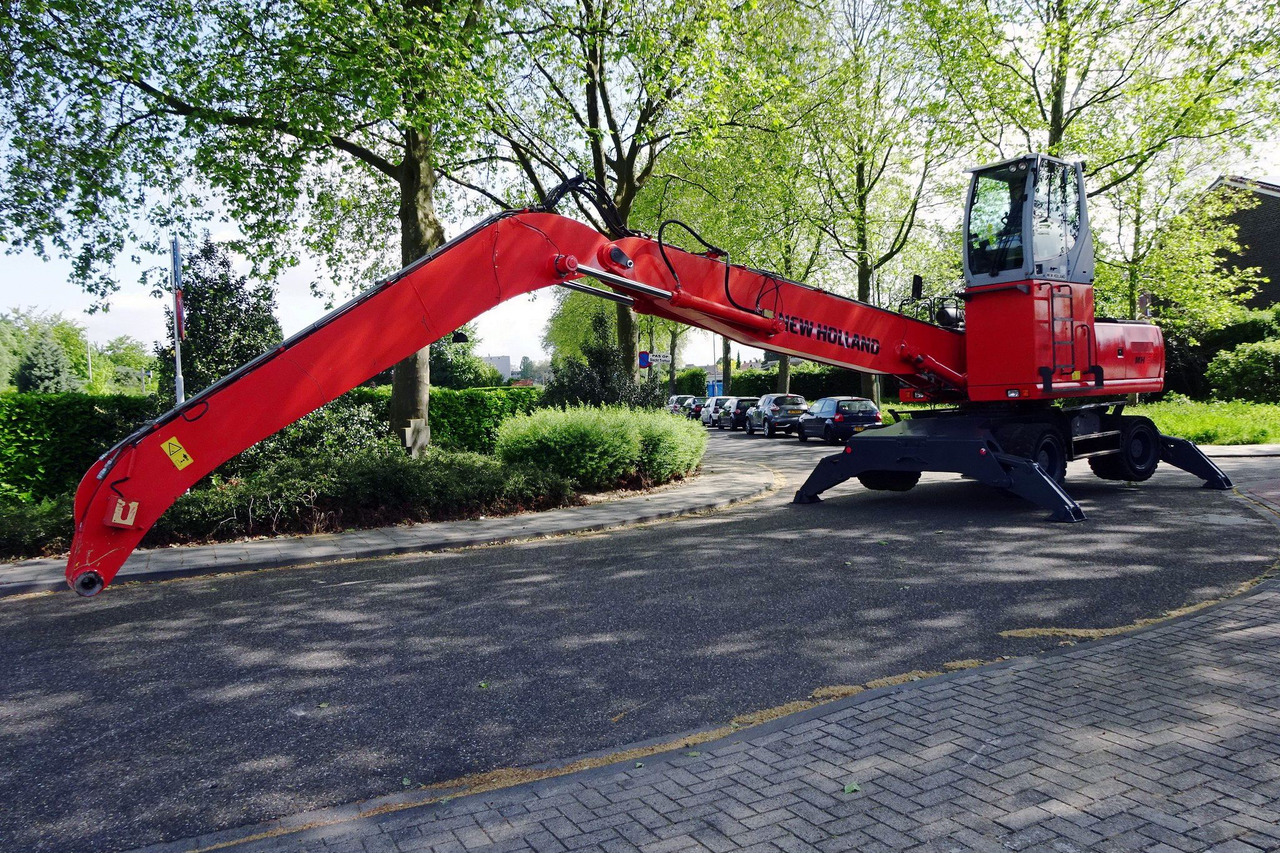 New Holland MH 6.6 Materialhandler With Magnet System - Ekskavator për mbetje: foto 2 New Holland MH 6.6 Materialhandler With Magnet System - Ekskavator për mbetje: foto 2