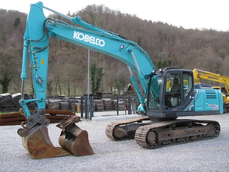 Kobelco SK210NLC-10 Vsa oprema TOP stanje - Ekskavator me zinxhirë: foto 1 Kobelco SK210NLC-10 Vsa oprema TOP stanje - Ekskavator me zinxhirë: foto 1