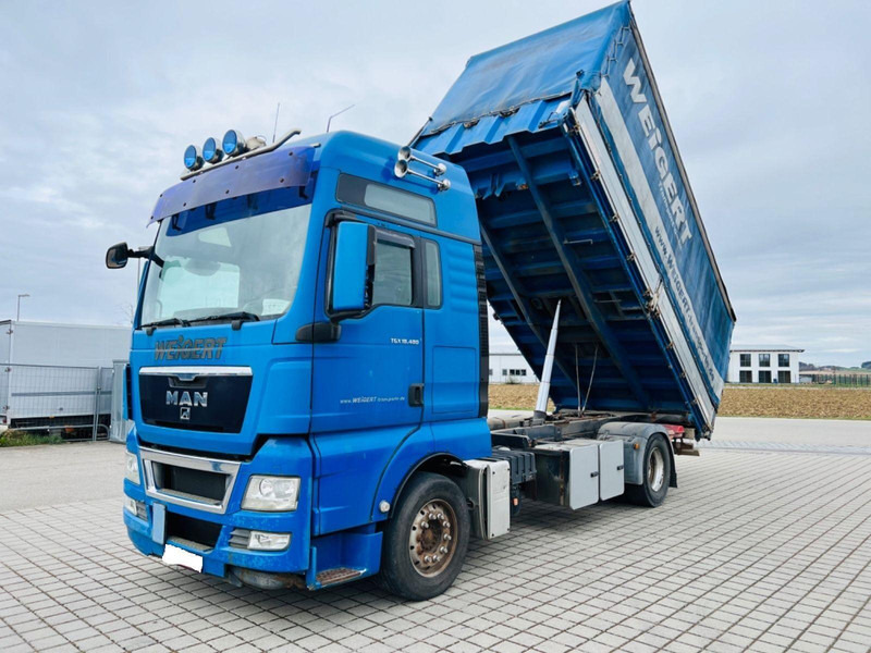 MAN TGX 18.480 - Kamion vetëshkarkues: foto 1 MAN TGX 18.480 - Kamion vetëshkarkues: foto 1