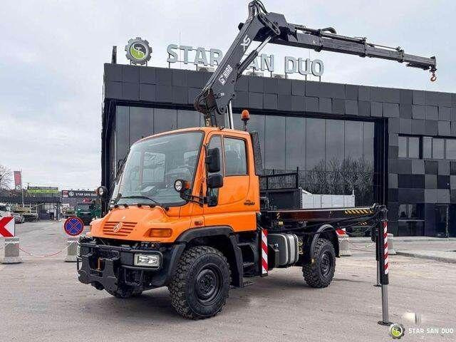 Mercedes-Benz UNIMOG U300 4x4 HIAB 122 D-3 CRANE - Kamion vetëshkarkues, Kamion me vinç: foto 1 Mercedes-Benz UNIMOG U300 4x4 HIAB 122 D-3 CRANE - Kamion vetëshkarkues, Kamion me vinç: foto 1