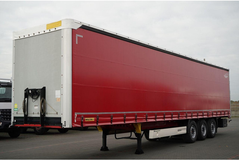 Wielton FIRANKA STANDARD / MULDA DO STALI - 9 M  / OŚ PODNOSZONA / SAF - Gjysmë rimorkio me tendë: foto 1 Wielton FIRANKA STANDARD / MULDA DO STALI - 9 M  / OŚ PODNOSZONA / SAF - Gjysmë rimorkio me tendë: foto 1