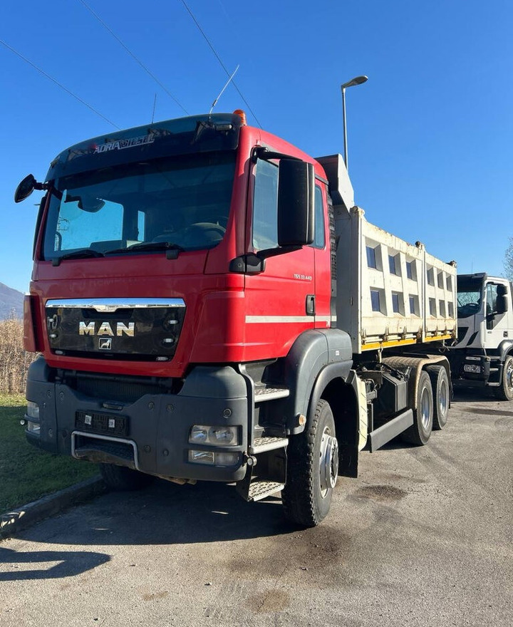 MAN TGA 33.440 - Kamion vetëshkarkues: foto 2 MAN TGA 33.440 - Kamion vetëshkarkues: foto 2
