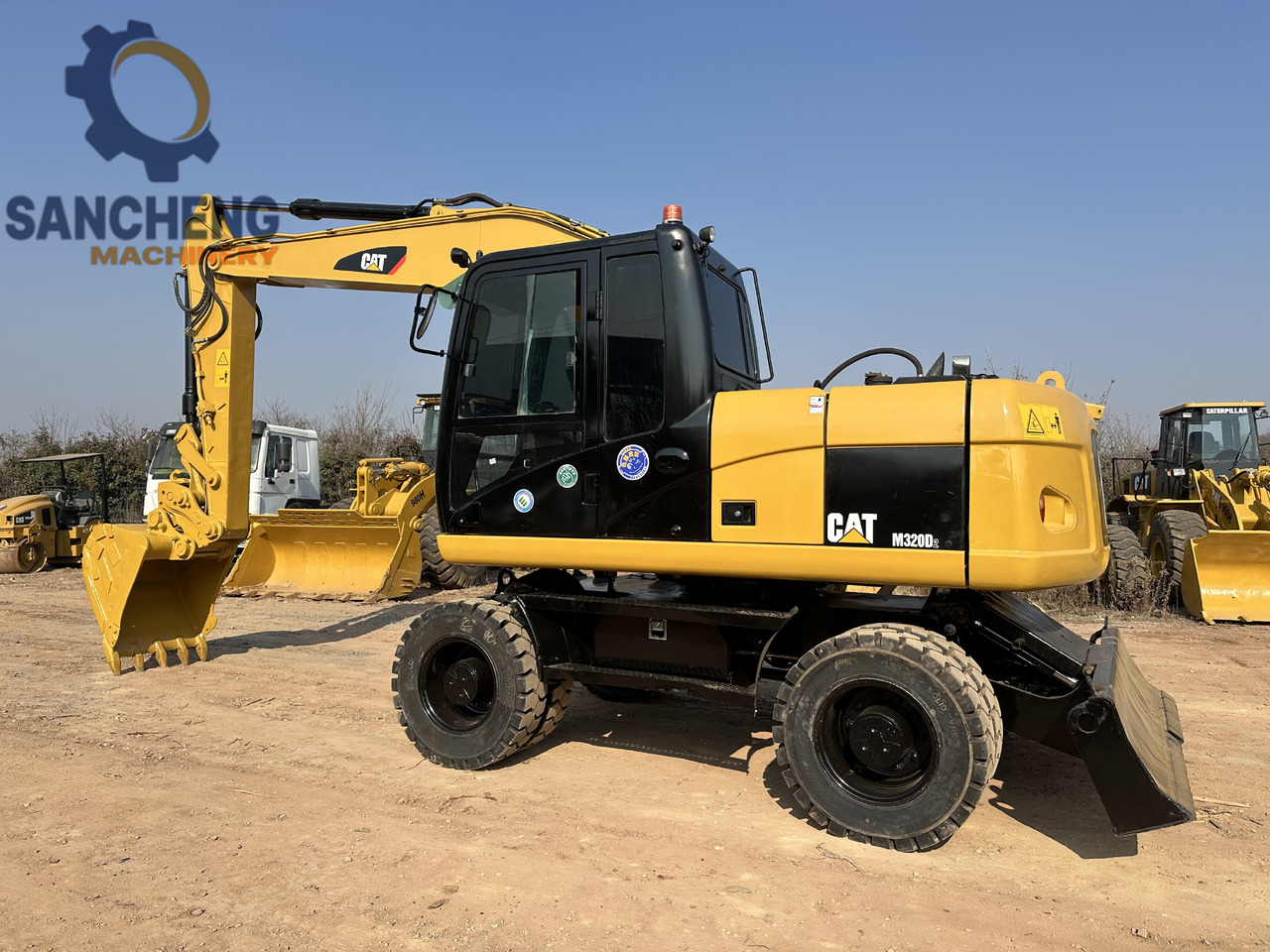 CATERPILLAR M320D2 - Ekskavator me goma: foto 1 CATERPILLAR M320D2 - Ekskavator me goma: foto 1
