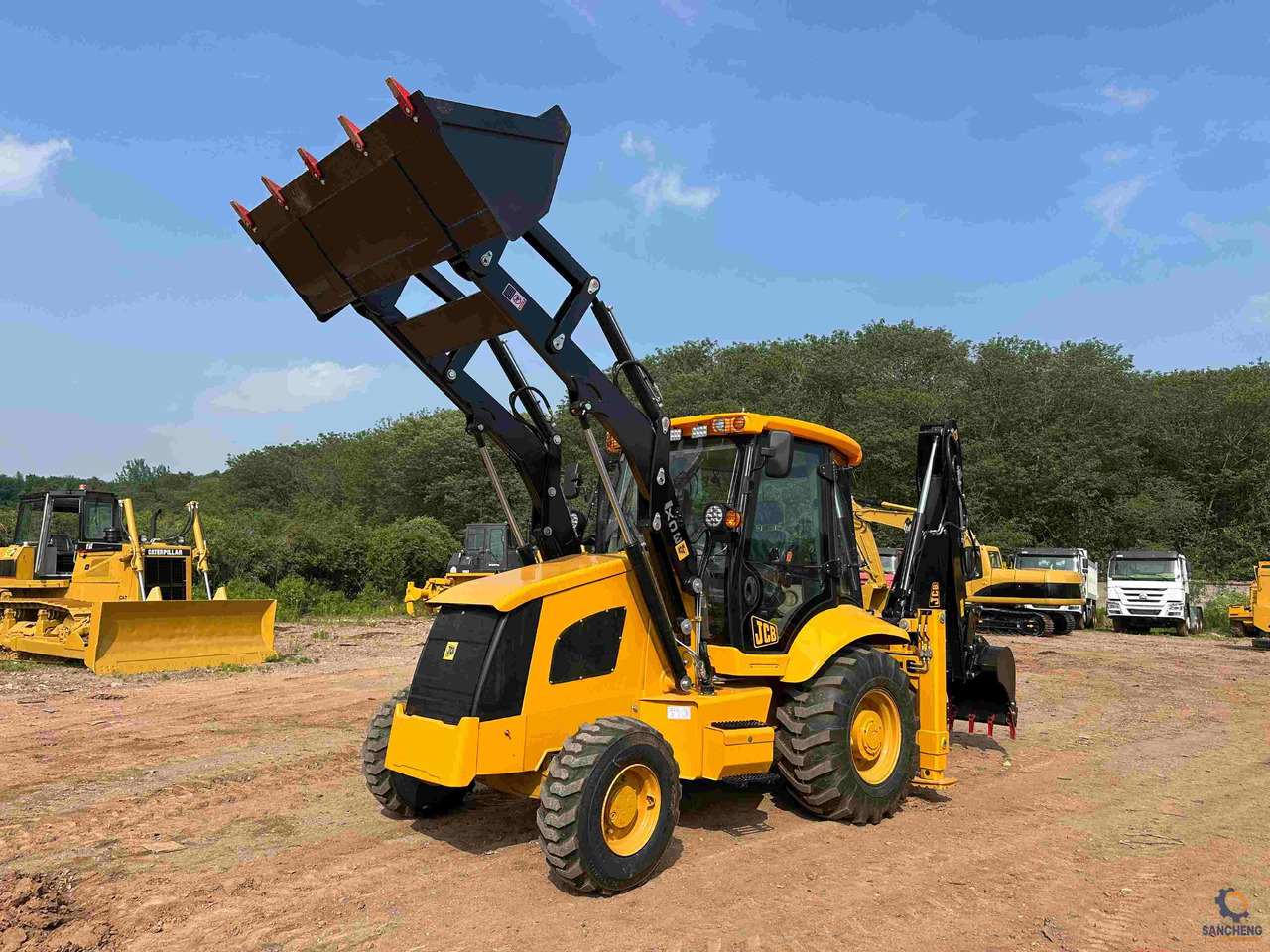 JCB 3CX - Fadromë me shkarkim nga prapa: foto 3 JCB 3CX - Fadromë me shkarkim nga prapa: foto 3