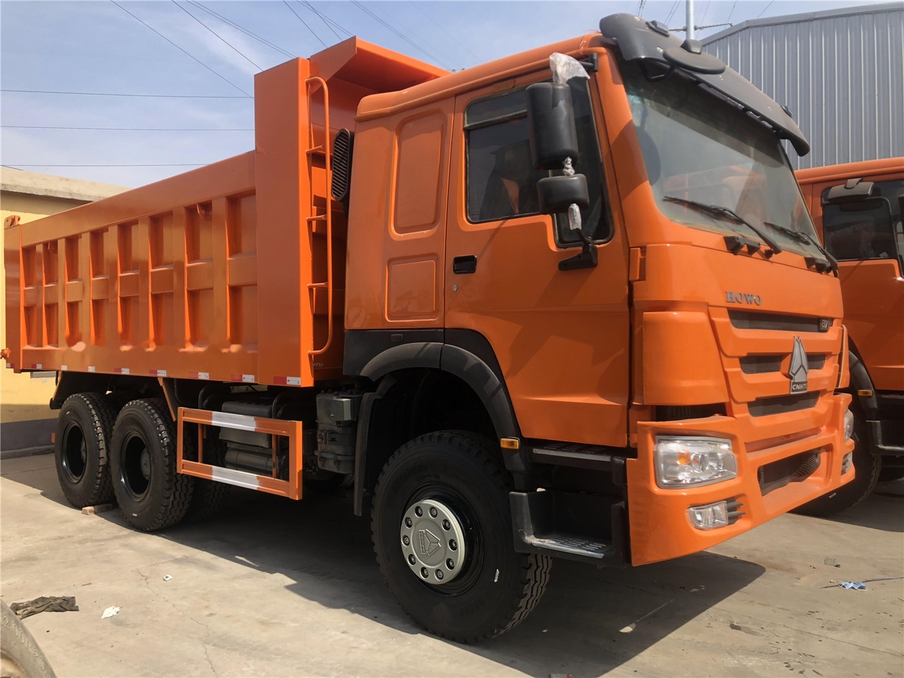 SINOTRUK HOWO 371 Dump truck - Kamion vetëshkarkues: foto 3 SINOTRUK HOWO 371 Dump truck - Kamion vetëshkarkues: foto 3