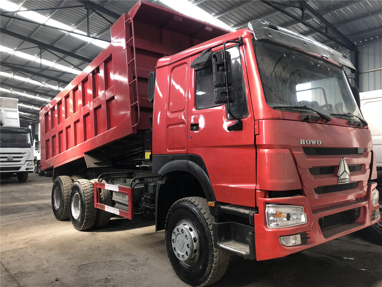 SINOTRUK Howo Dump truck 371 - Kamion vetëshkarkues: foto 1 SINOTRUK Howo Dump truck 371 - Kamion vetëshkarkues: foto 1