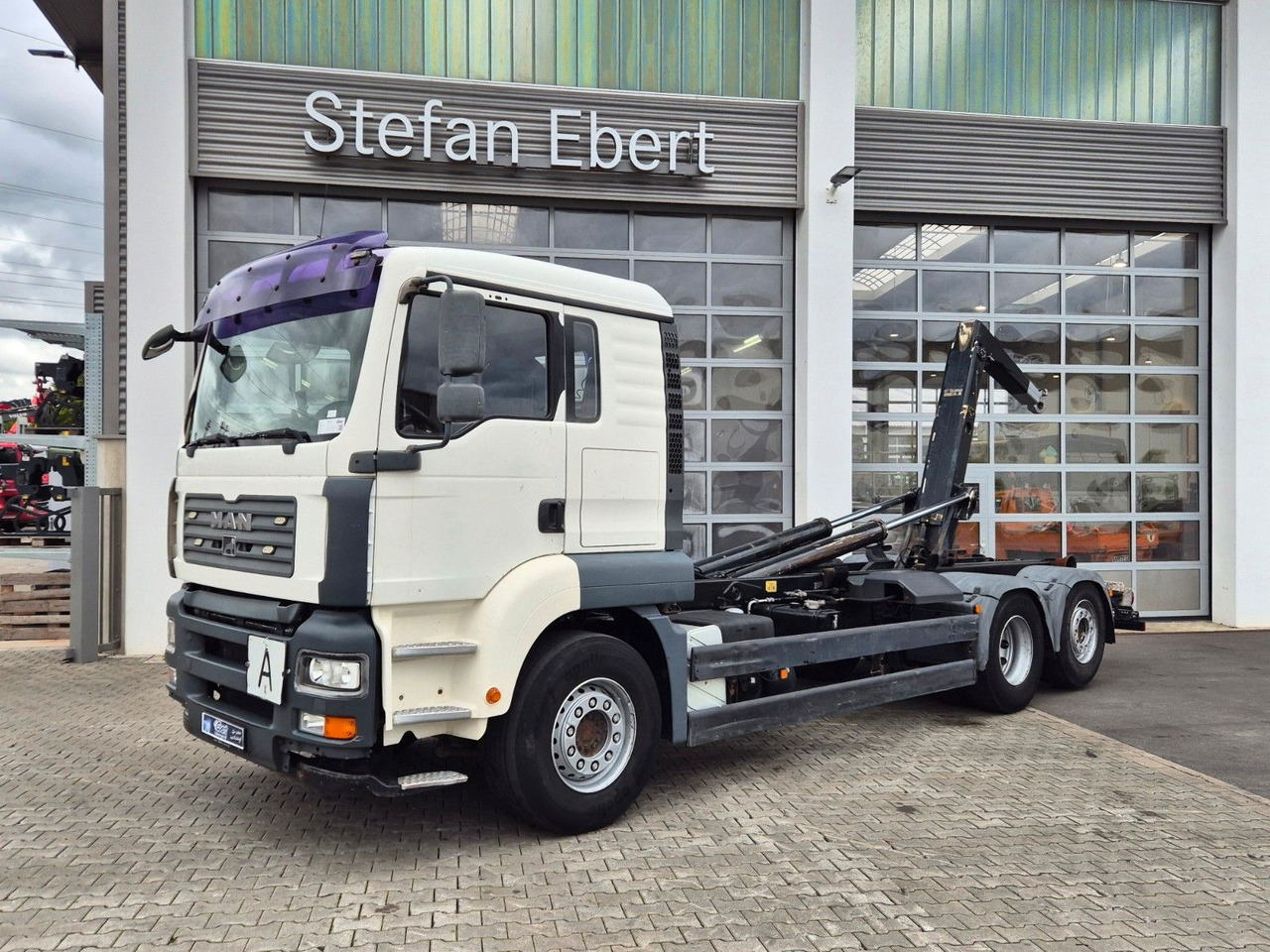 MAN TGA 26.440 6x2-2 BL Meiller RK 20.70 Bett - Kamion vetëngarkues: foto 1 MAN TGA 26.440 6x2-2 BL Meiller RK 20.70 Bett - Kamion vetëngarkues: foto 1