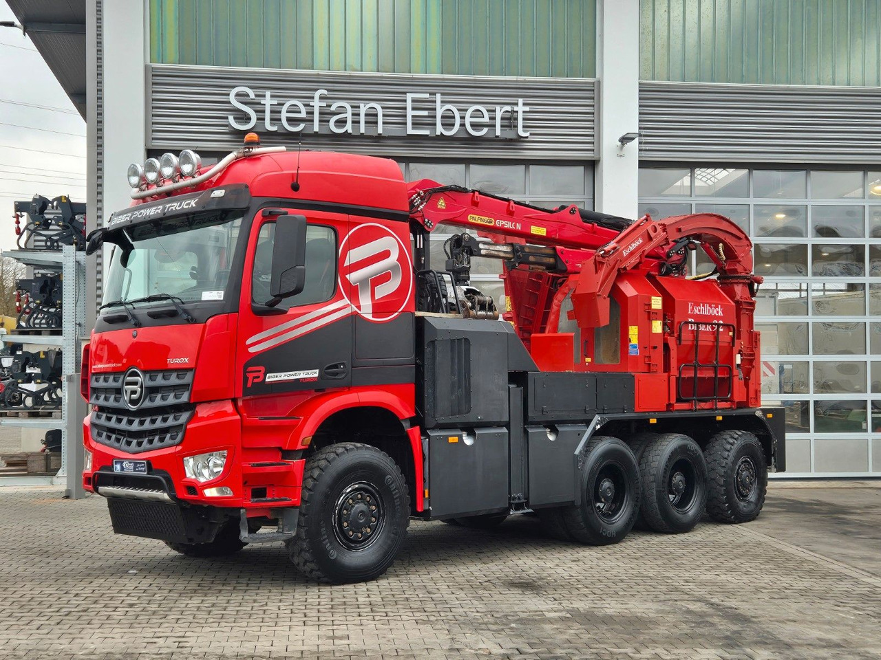 Mercedes-Benz TUROX 8x8 Eschlböck Biber 92 Holzhacker / 1.512h - Kamion për transport druri, Kamion me vinç: foto 1 Mercedes-Benz TUROX 8x8 Eschlböck Biber 92 Holzhacker / 1.512h - Kamion për transport druri, Kamion me vinç: foto 1