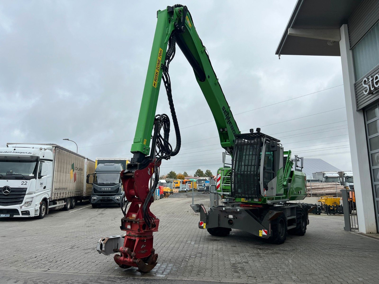 Sennebogen 718 / inkl. Vosch Fällzange / nur 1.965h! - Ekskavator me goma: foto 5 Sennebogen 718 / inkl. Vosch Fällzange / nur 1.965h! - Ekskavator me goma: foto 5