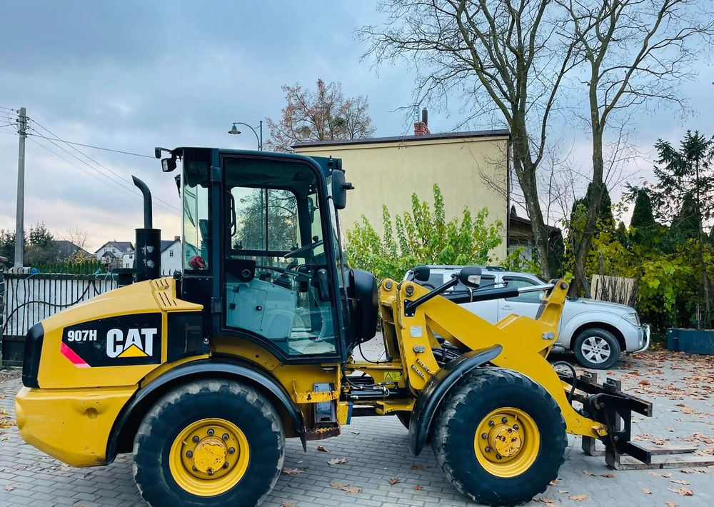 Caterpillar 907H - Fadrom me goma: foto 1 Caterpillar 907H - Fadrom me goma: foto 1