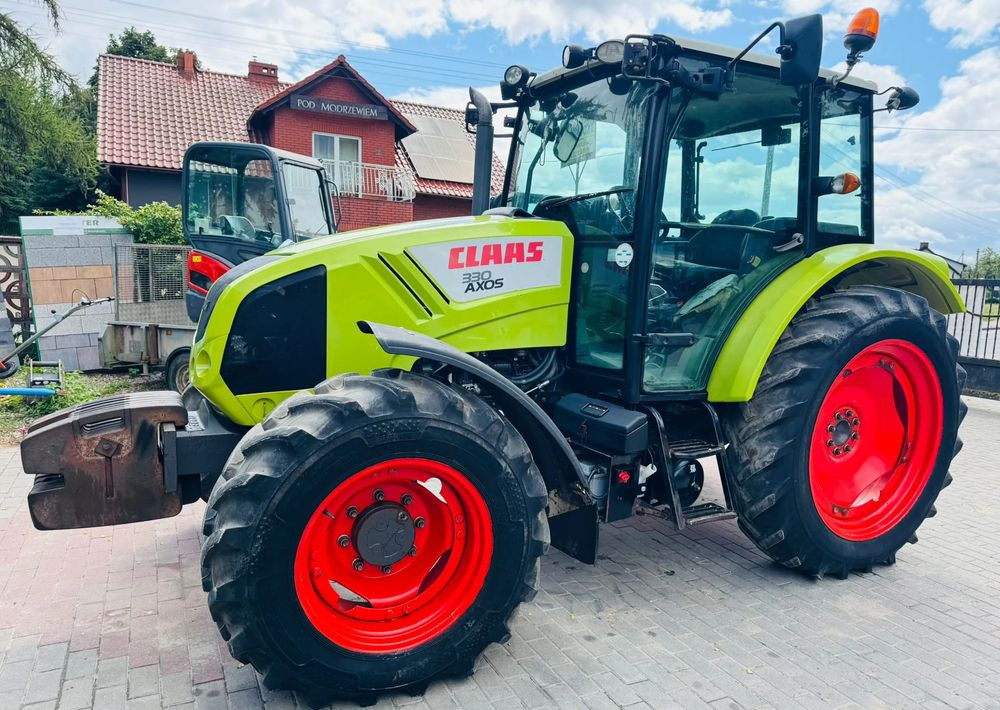 Claas Axos 330 - Traktor: foto 4 Claas Axos 330 - Traktor: foto 4