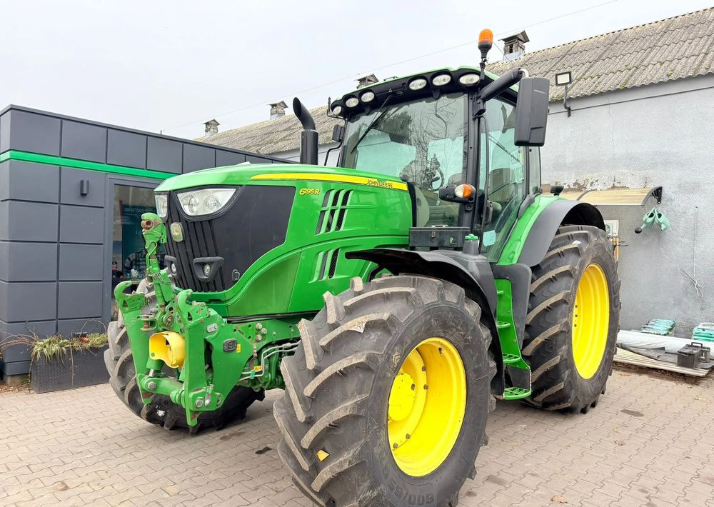 John Deere 6195 R - Traktor: foto 1 John Deere 6195 R - Traktor: foto 1