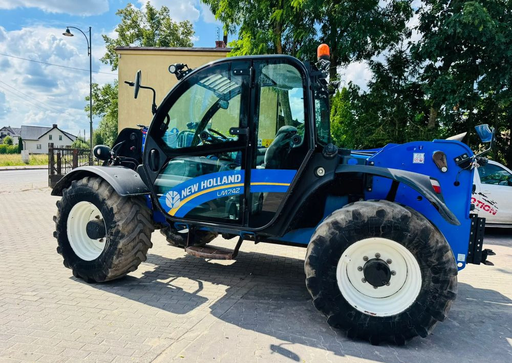 New Holland L7.42 - Ekskavator teleskopik: foto 1 New Holland L7.42 - Ekskavator teleskopik: foto 1
