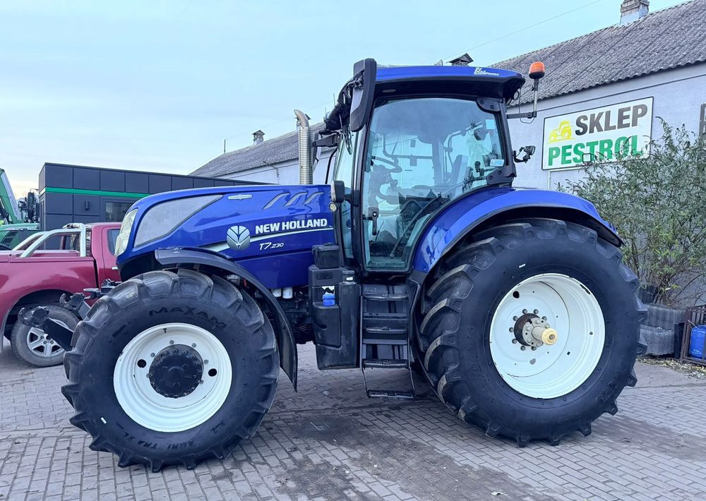 New Holland T7.230 Blue Power Autocommand - Traktor: foto 1 New Holland T7.230 Blue Power Autocommand - Traktor: foto 1