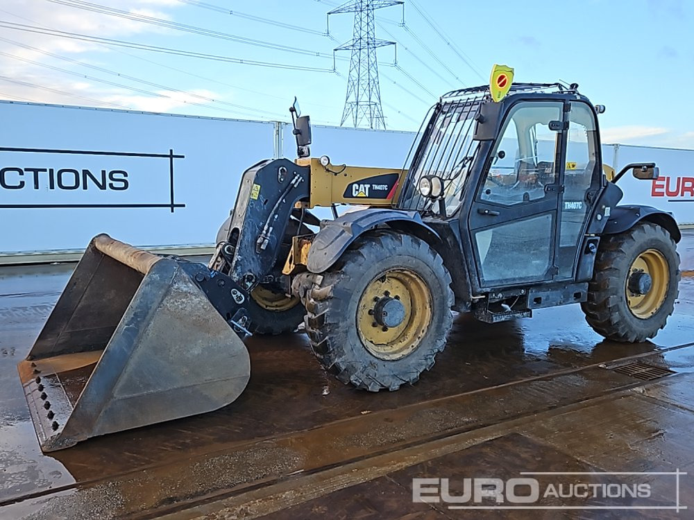 2013 CAT TH407C - Ekskavator teleskopik: foto 1 2013 CAT TH407C - Ekskavator teleskopik: foto 1