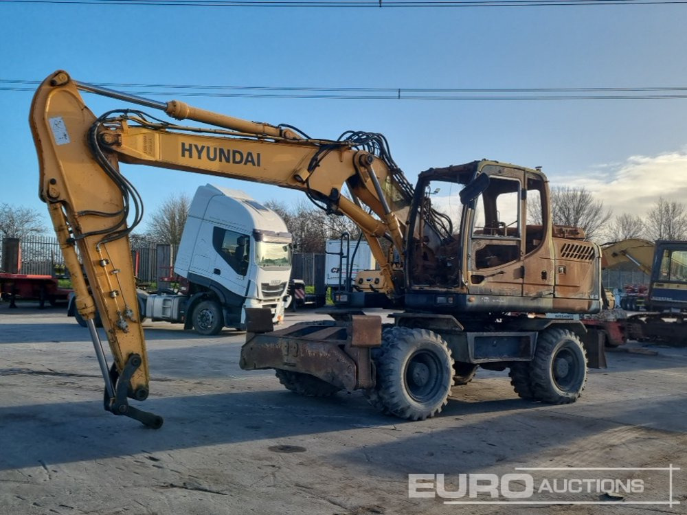 2013 Hyundai ROBEX140W-9 - Ekskavator me goma: foto 1 2013 Hyundai ROBEX140W-9 - Ekskavator me goma: foto 1