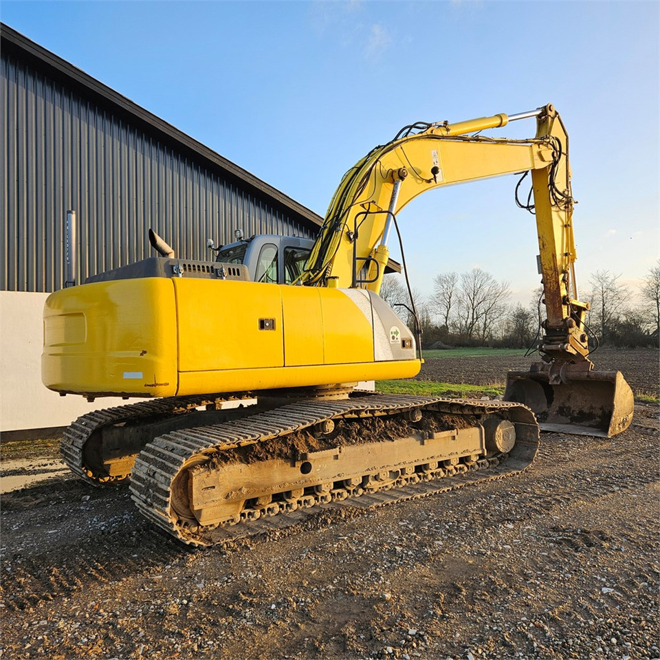 New Holland E 305 - Ekskavator me zinxhirë: foto 4 New Holland E 305 - Ekskavator me zinxhirë: foto 4