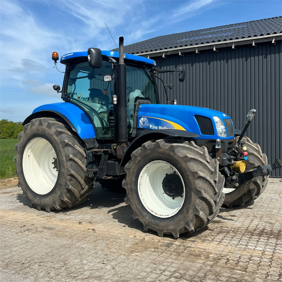 New Holland T6050 - Traktor: foto 2 New Holland T6050 - Traktor: foto 2