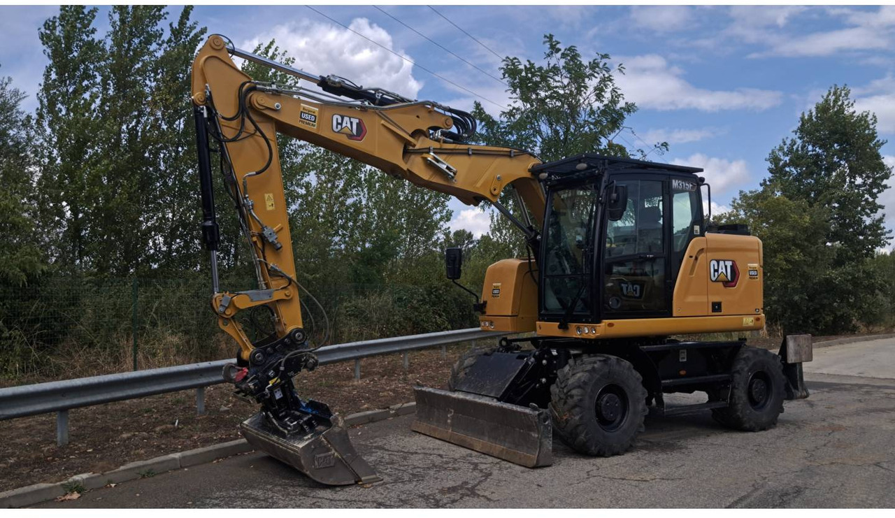CAT M315F IVC - Ekskavator me goma: foto 1 CAT M315F IVC - Ekskavator me goma: foto 1