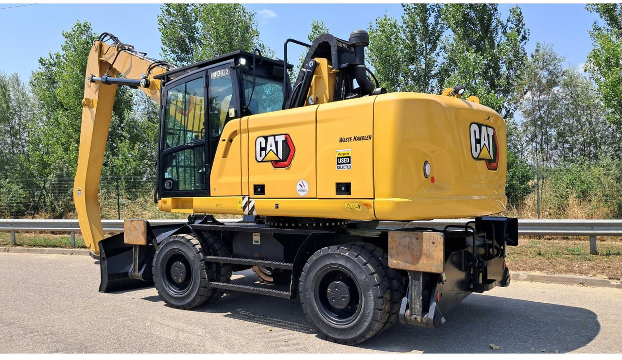 CAT MH3022-1 - Ekskavator me goma: foto 4 CAT MH3022-1 - Ekskavator me goma: foto 4