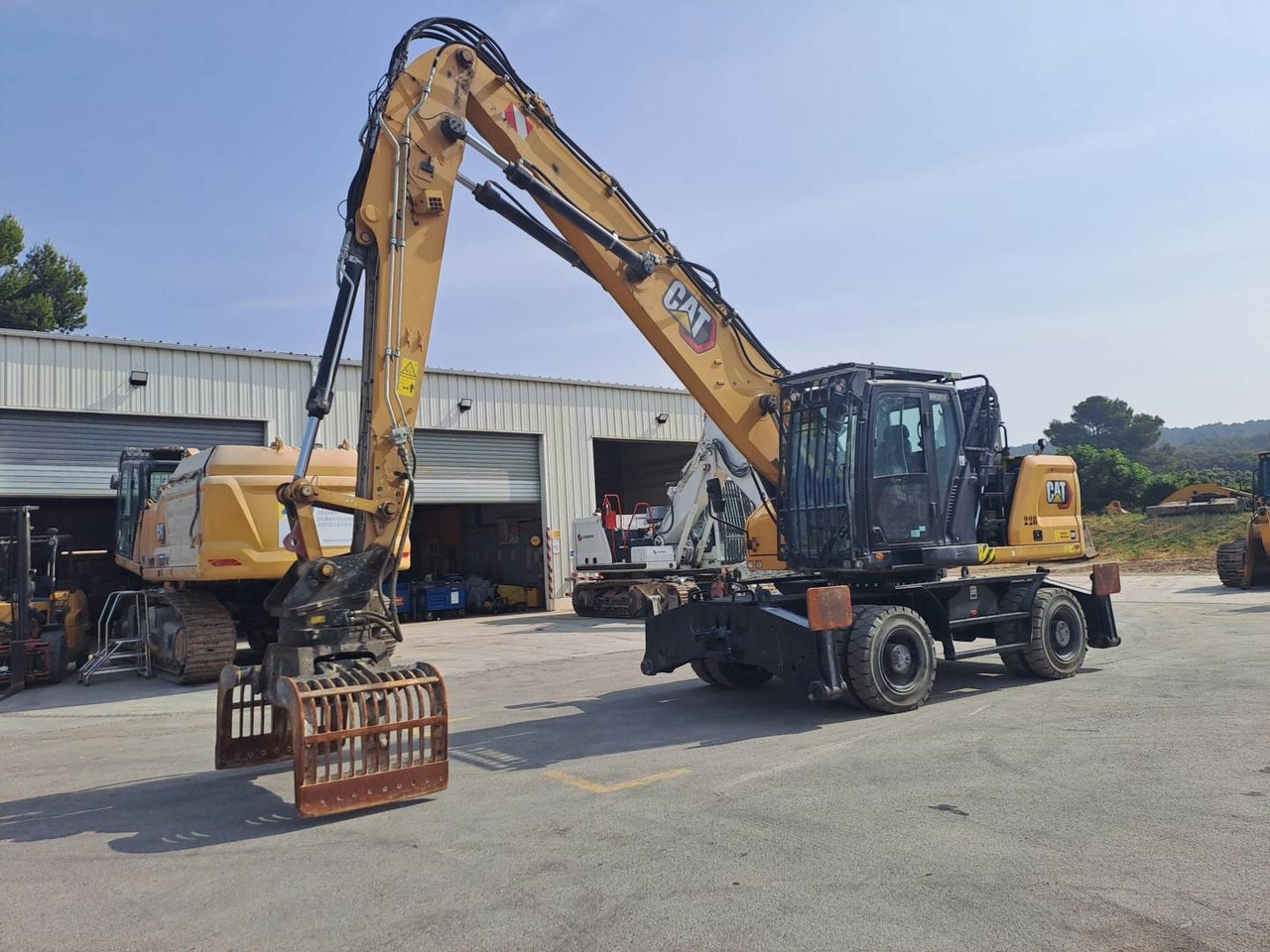 CAT MH3024 - Ekskavator me goma: foto 1 CAT MH3024 - Ekskavator me goma: foto 1