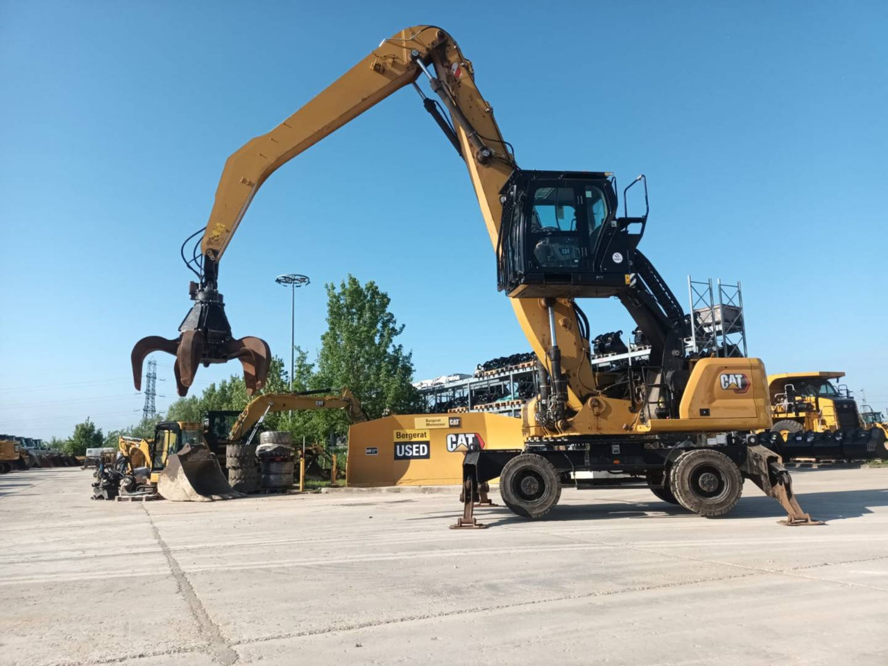 CAT MH3026 - Ekskavator me goma: foto 1 CAT MH3026 - Ekskavator me goma: foto 1