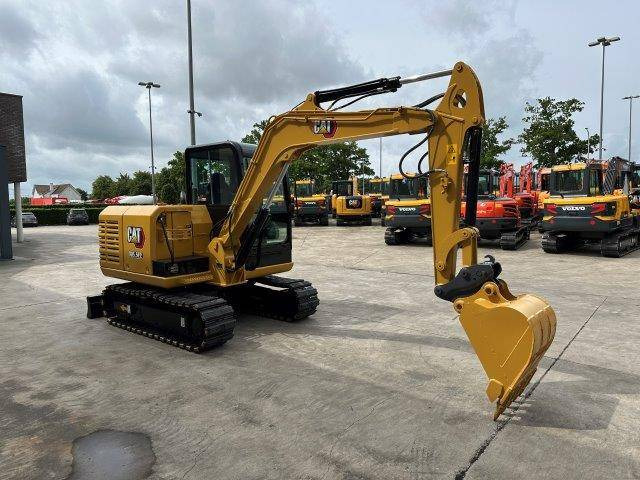 Caterpillar 305.5E2 - Ekskavator me zinxhirë: foto 3 Caterpillar 305.5E2 - Ekskavator me zinxhirë: foto 3