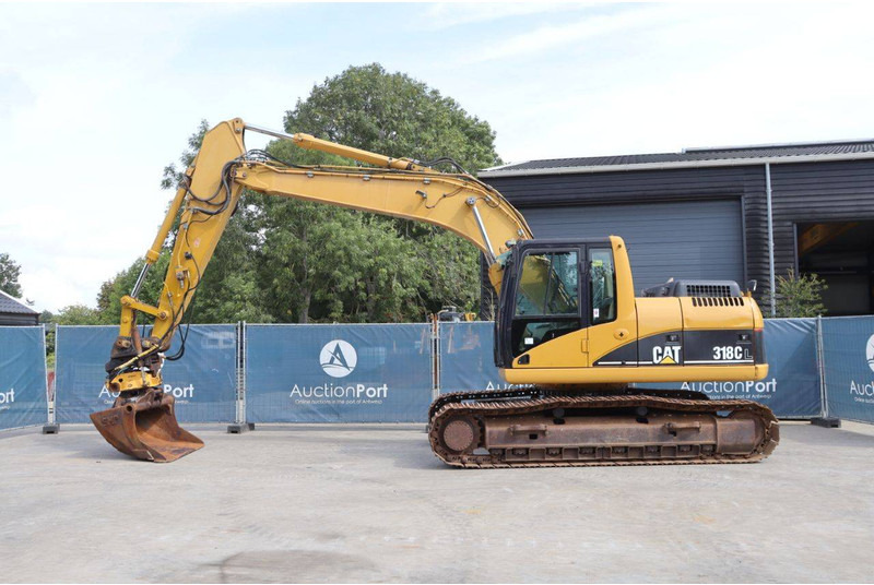 Caterpillar 318C - Ekskavator me zinxhirë: foto 2 Caterpillar 318C - Ekskavator me zinxhirë: foto 2