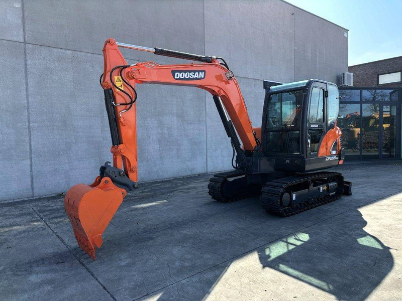 Doosan DX55-9C - Ekskavator me zinxhirë: foto 1 Doosan DX55-9C - Ekskavator me zinxhirë: foto 1
