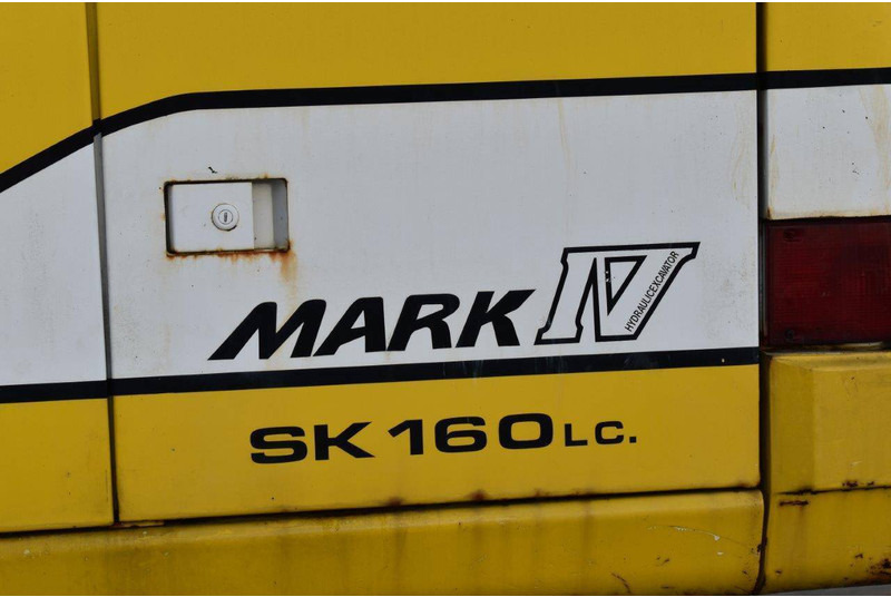 Ekskavator me zinxhirë Kobelco SK160LC: foto 9