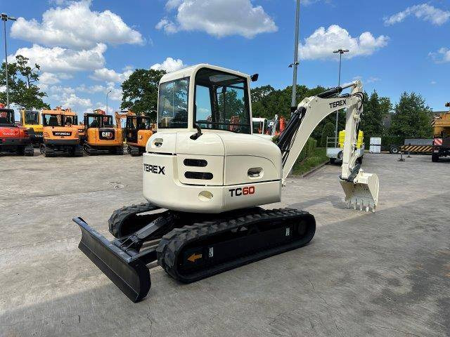 Terex TC60 - Ekskavator me zinxhirë: foto 4 Terex TC60 - Ekskavator me zinxhirë: foto 4