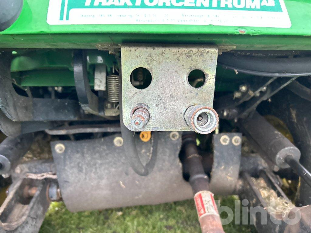 Korrëse bari i kopshtit John Deere 1565 Series II 4WD: foto 16